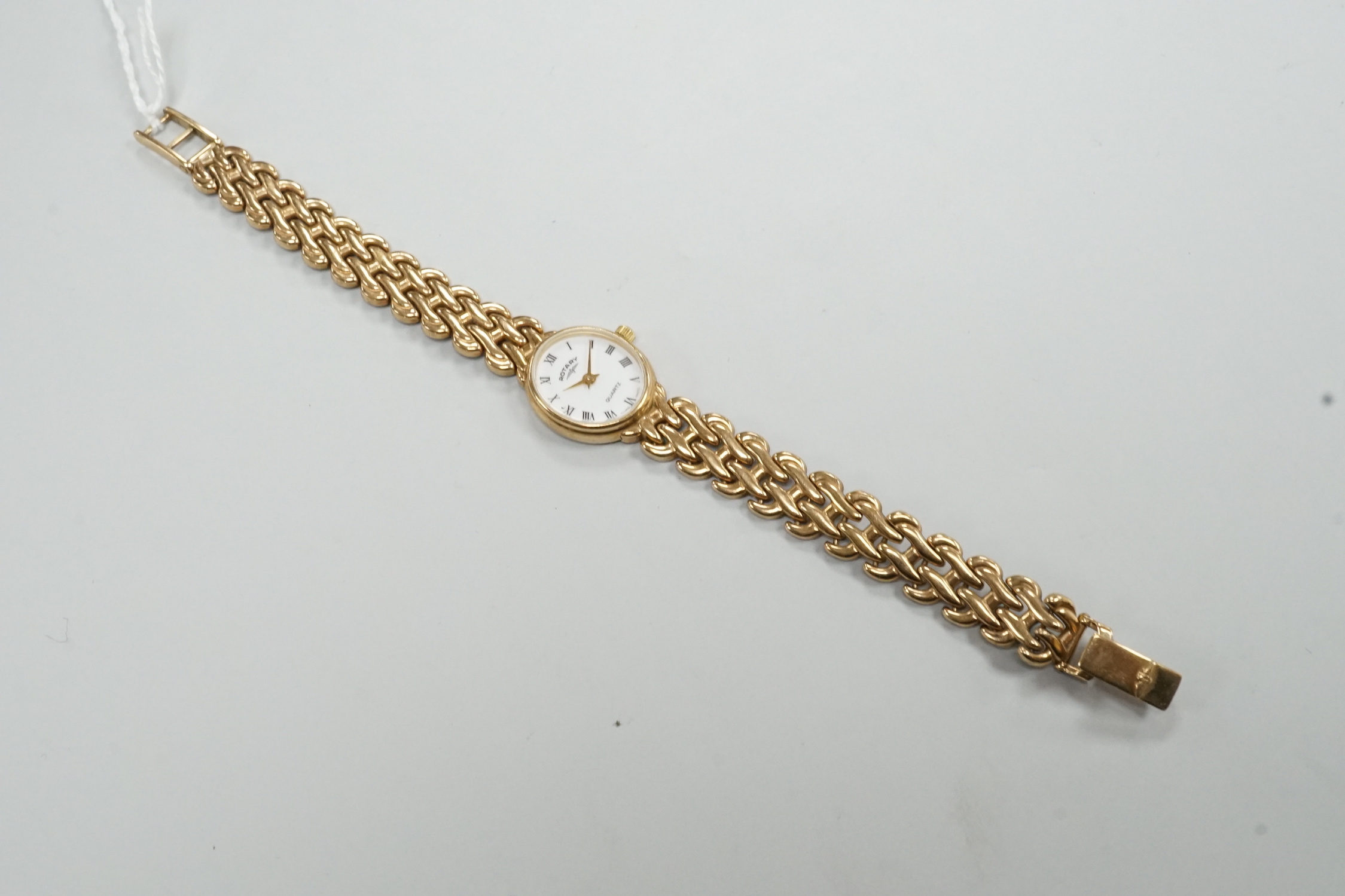 A lady's modern 9ct gold Rotary quartz wrist watch, on a 9ct gold Rotary bracelet, overall 17.5cm gross weight 16.5 grams.